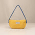 Nerakcos Yellow Bouclé Baguette Bag - front view, clean studio shot on neutral background