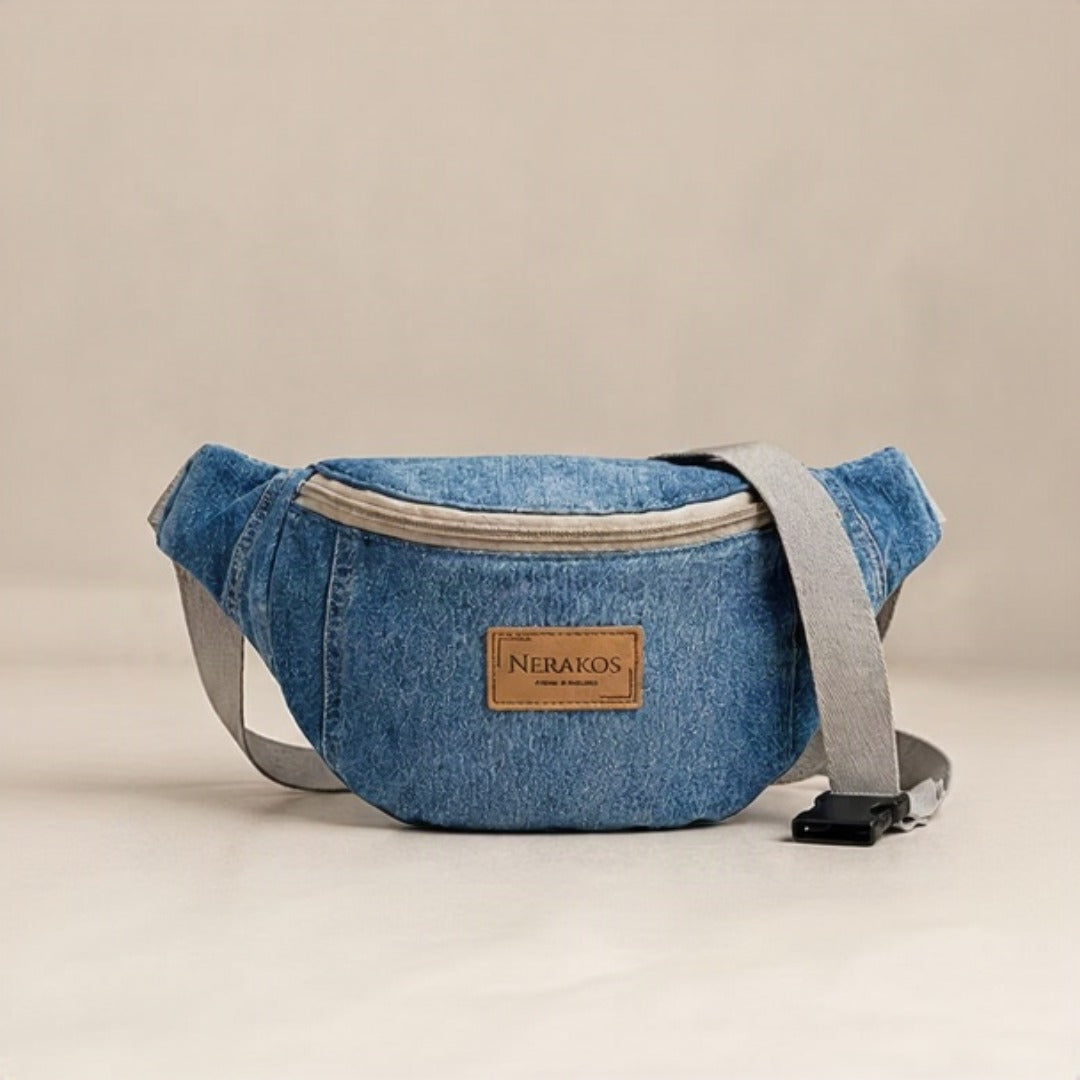 Nerakcos Denim Belt Bag - side profile view showing compact crescent silhouette