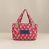 Nerakcos Pink Reindeer Quilted Mini Bag - front view with denim Nerakcos label visible