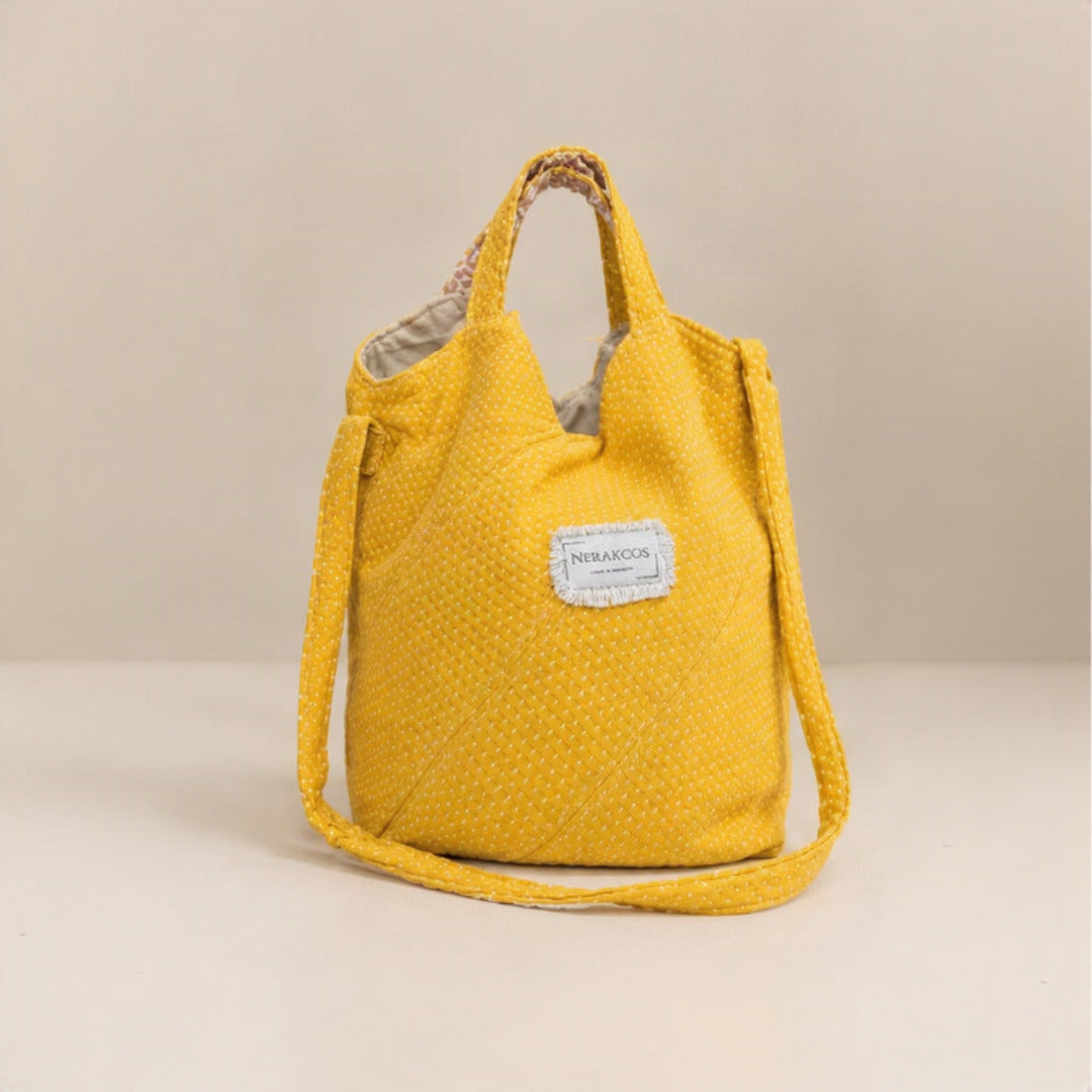 Nerakcos Yellow Bouclé Bucket Bag - front view with crossbody strap