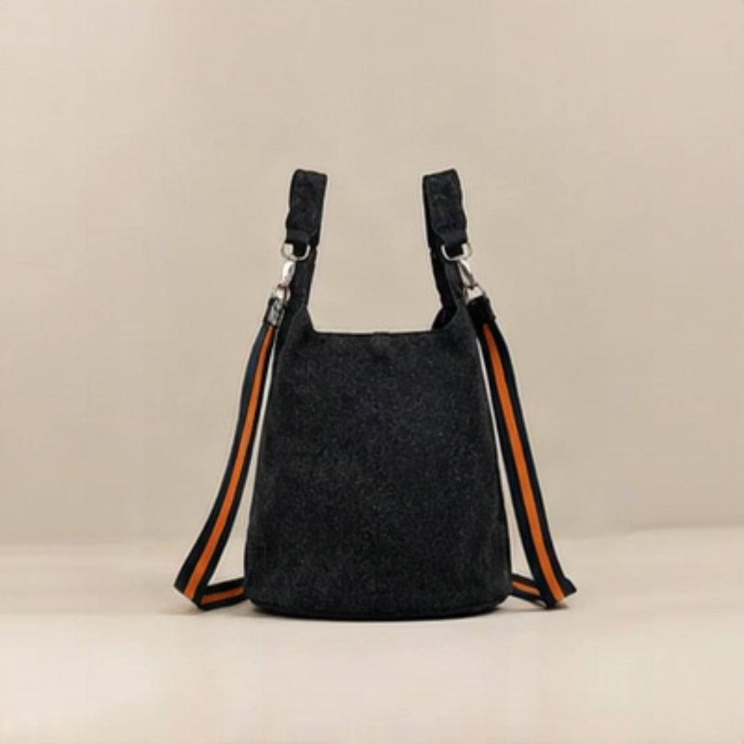 Top view showing open interior with black lining and interior zip pocket