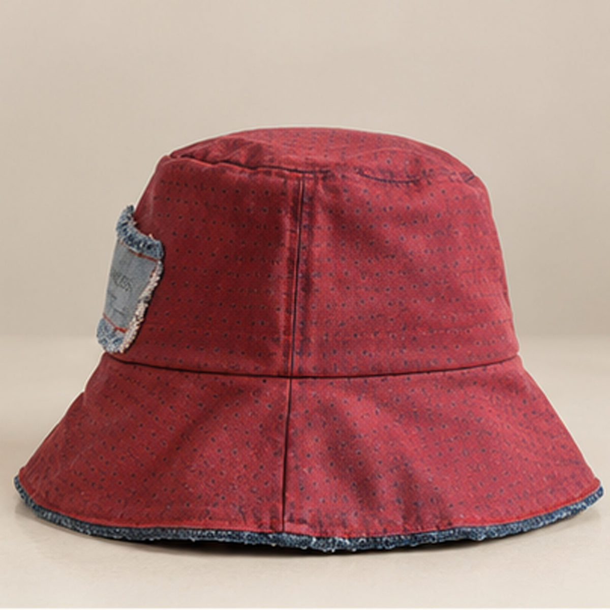 Upcycled Burgundy Denim Bucket Hat - side view with Nerakcos patch