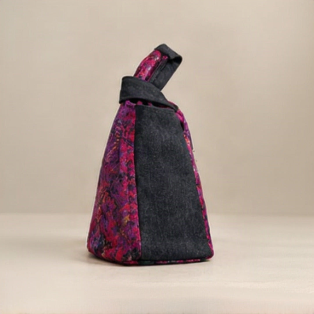 Top view showing open interior with black lining and zip pocket