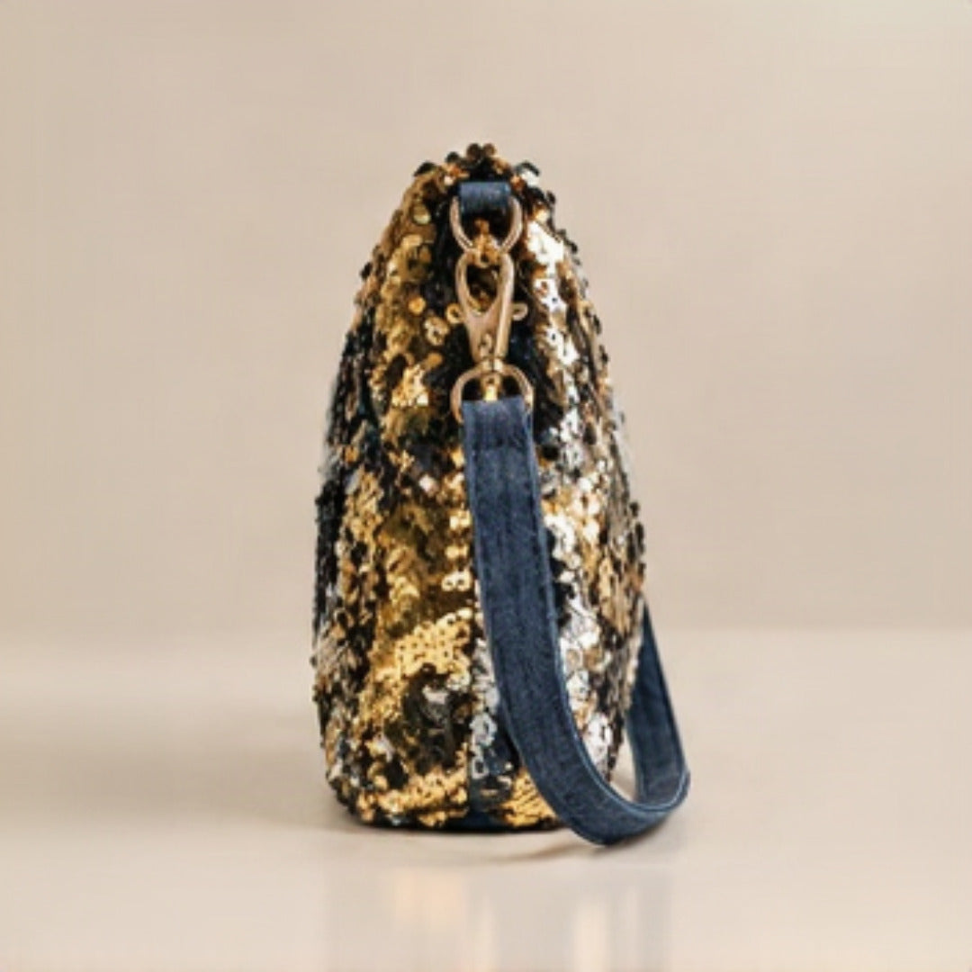 Close-up of mixed gold and silver sequin texture detail showing shimmer and reversible effect