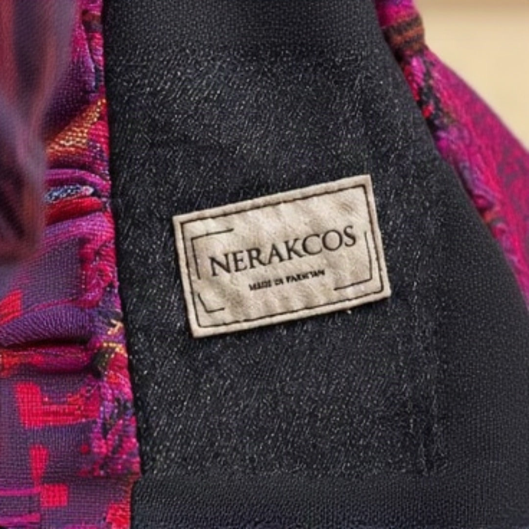 Nerakcos Floral Knot Bag - side view showing denim panel and label