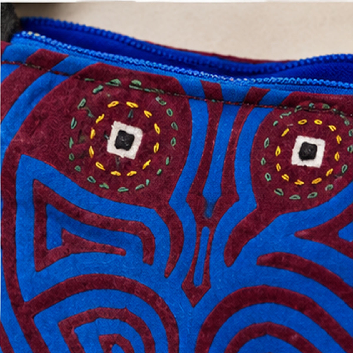 Back view of the burgundy crossbody bag