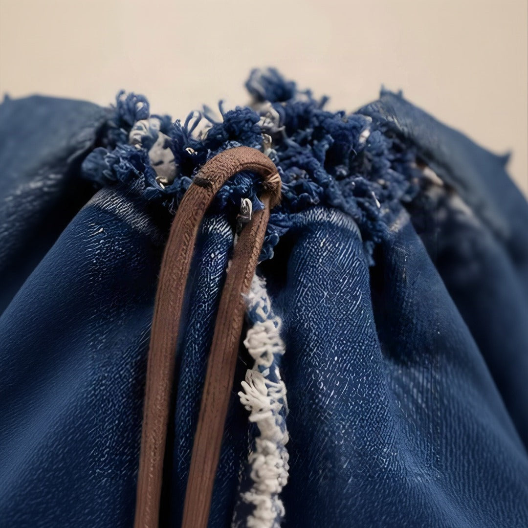 Front view of Nerakcos upcycled denim bucket bag