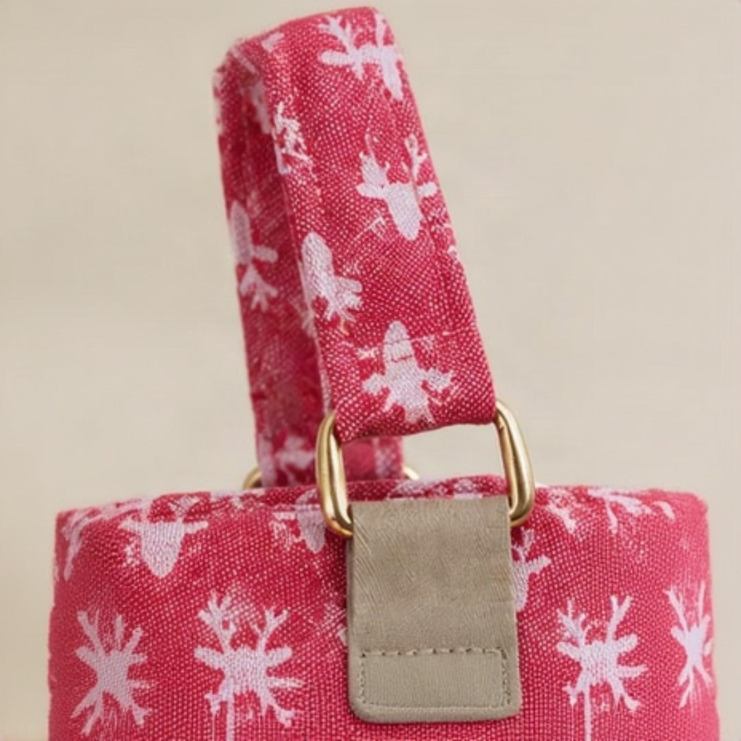 Close-up of reindeer silhouette print and quilted texture detail