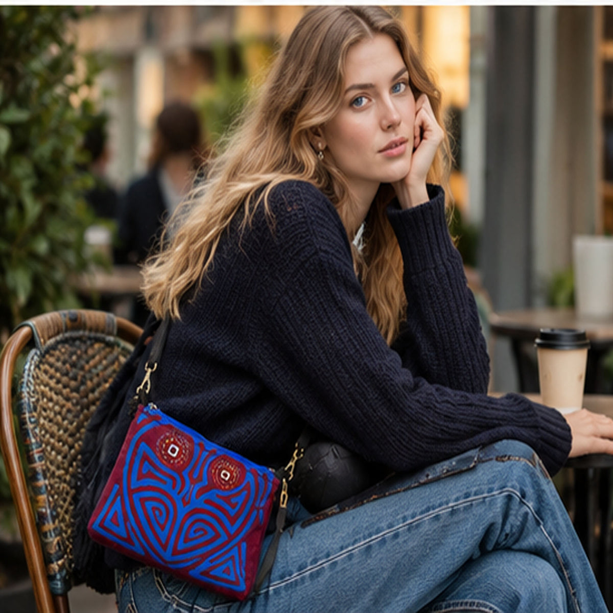 Overhead view of the embroidered crossbody bag