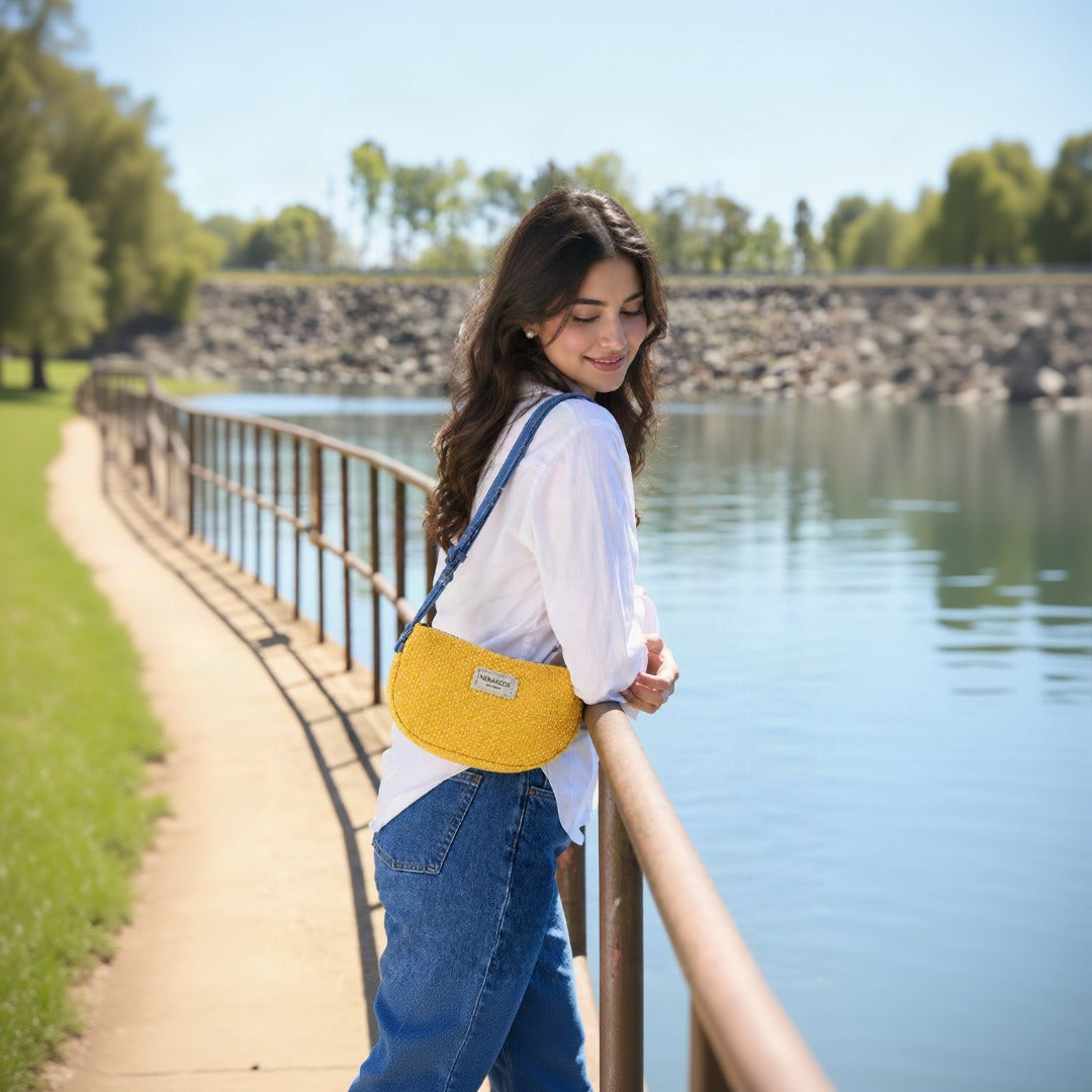 Lifestyle - model wearing Nerakcos Yellow Bouclé Baguette Bag crossbody by lakeside park